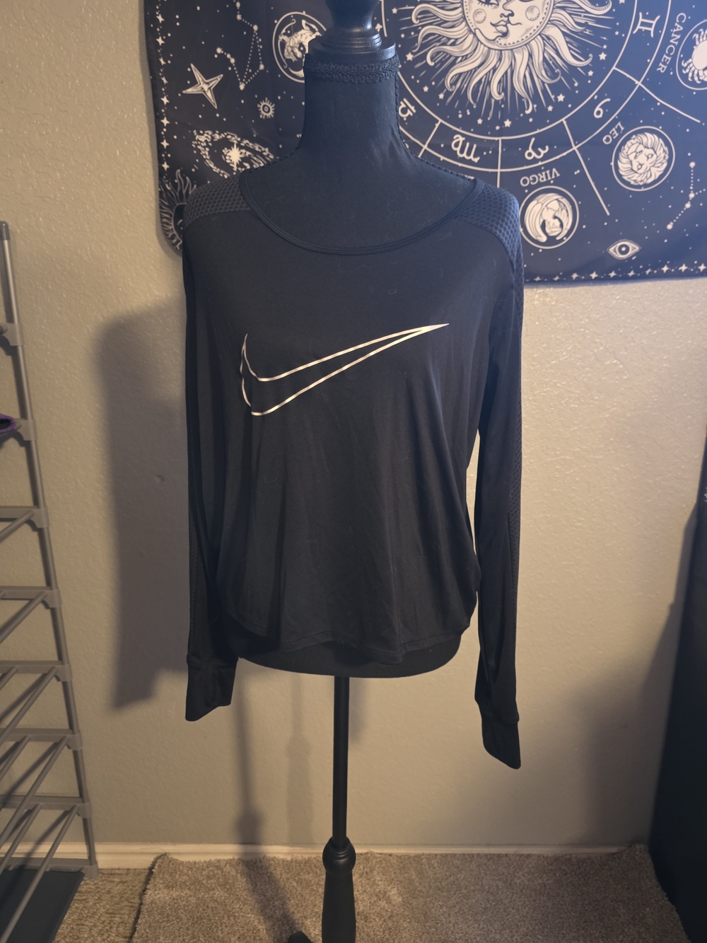 Nike Black Long-Sleeve Athletic Top with Metallic Swoosh